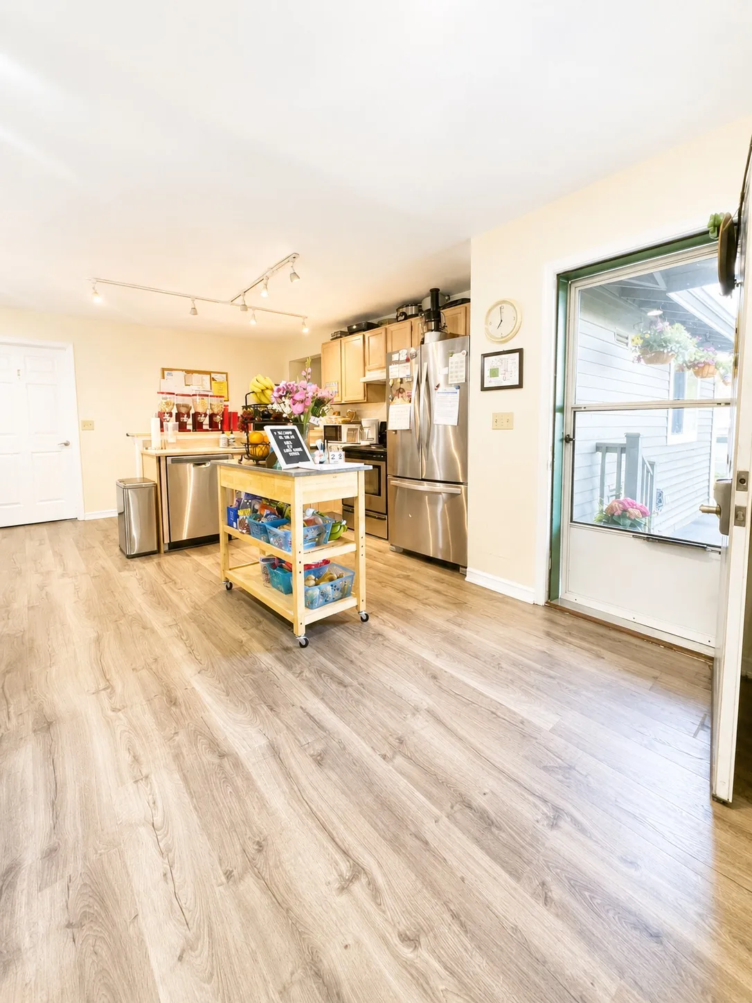 The bright open living and kitchen area at A WellCared
